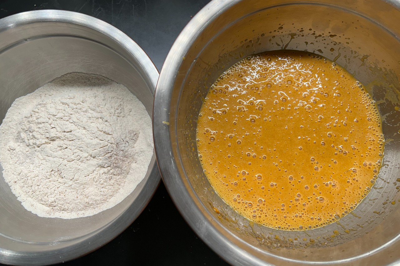 Mix together wet and dry ingredients to make moist and delicious pumpkin bread.