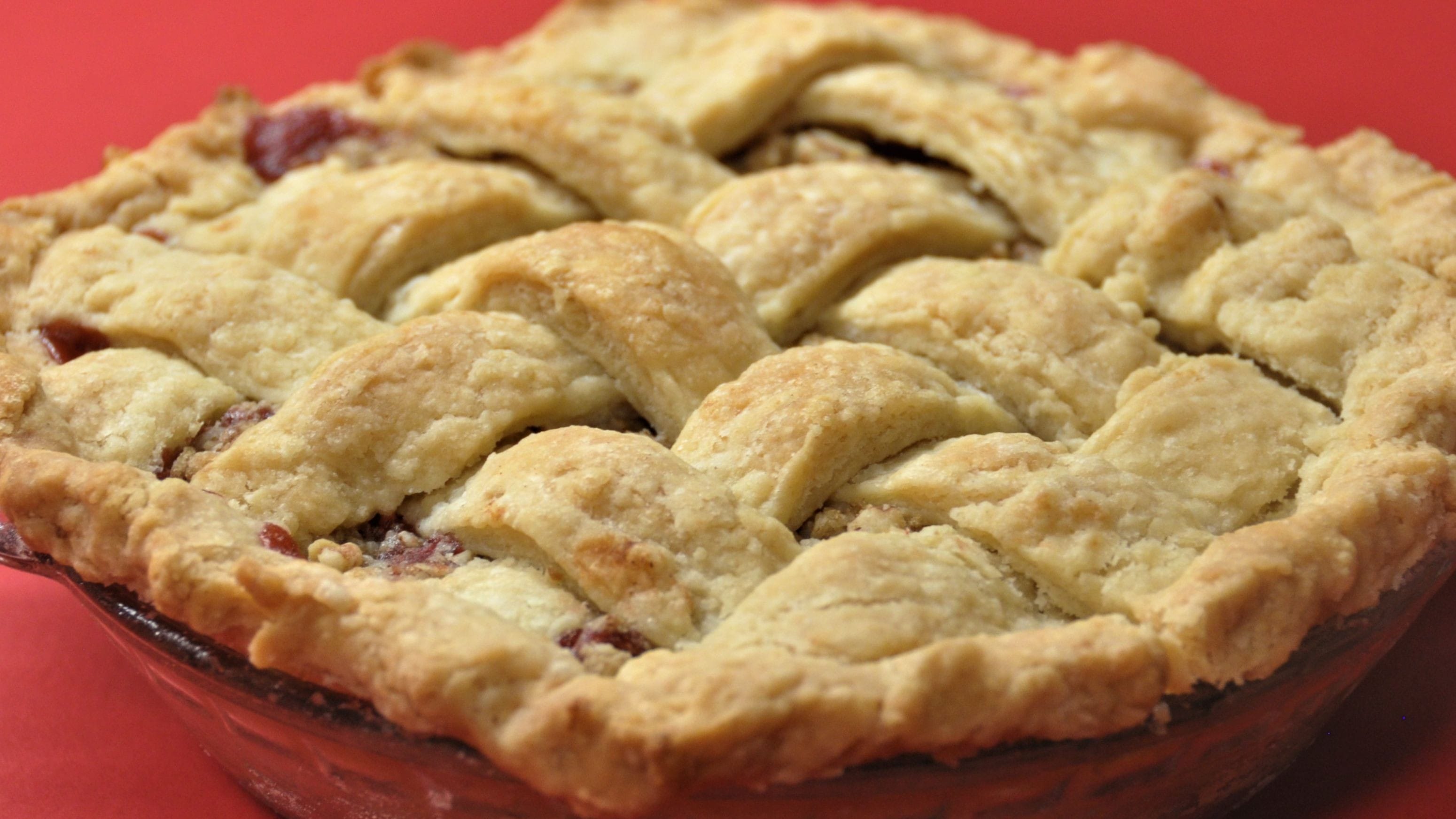 Lattice topped pie made with basic pie pastry that anyone can master. Pastry is made with butter and vegetable shortening for durability and flakiness.