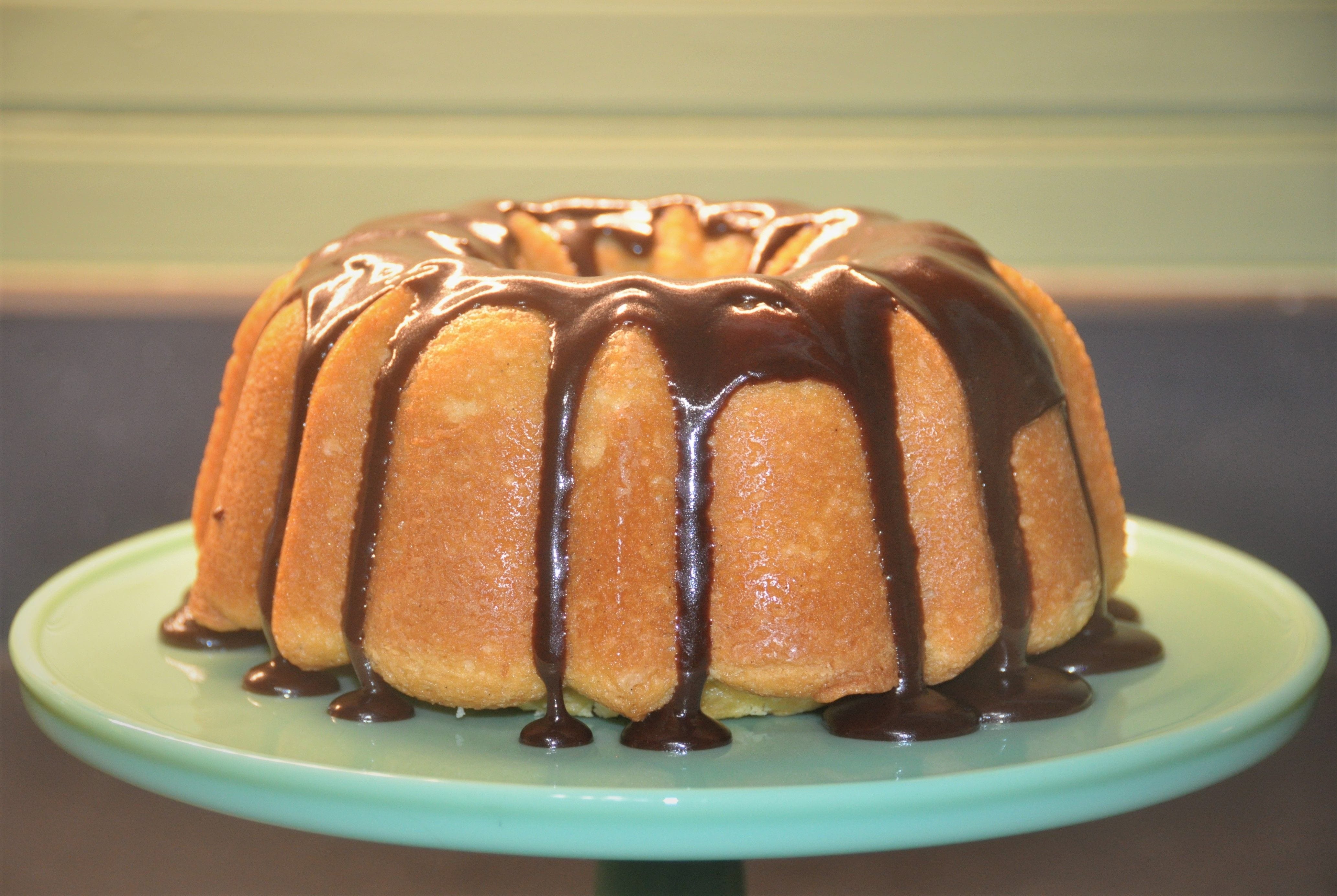 Classic pound cake recipe made with butter and cream and glazed with rich chocolate