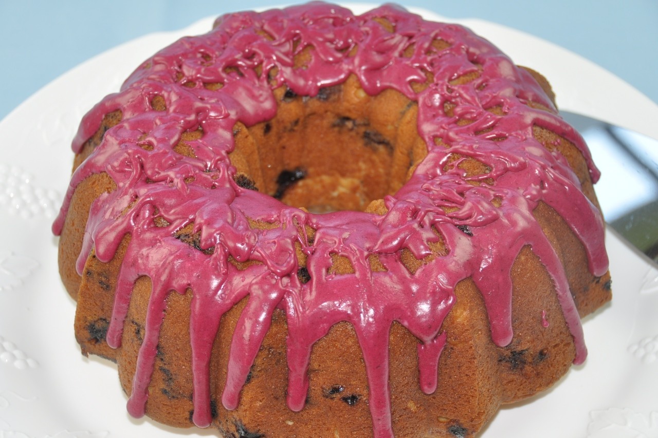 Fragrant pound cake packed with blueberries and flavored with lemon. Topped with blueberry glaze to intensify color and flavor. Moist, dense, and delicious.