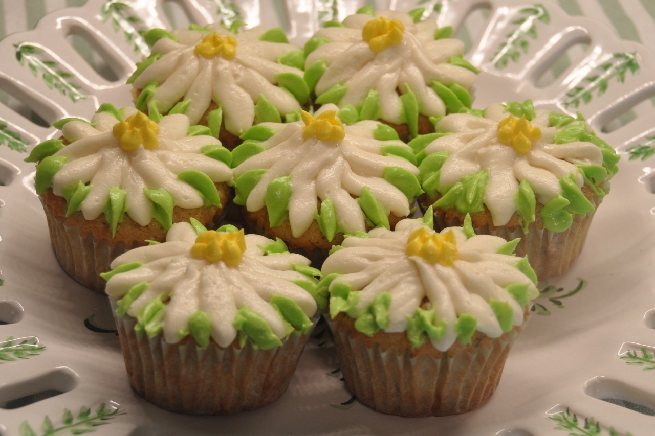 Chiffon cupcakes packed with fresh mint and lemon zest and topped with lemon buttercream frosting.