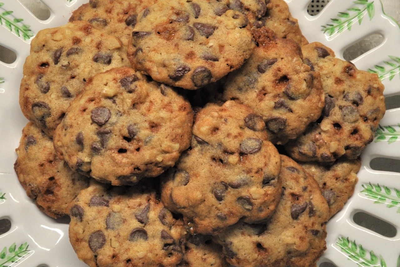 Cookies are packed with chocolate chips, walnuts, and caramelized sugar pieces.